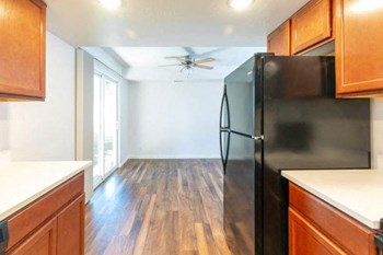 Modern Kitchen With Custom Cabinet at Devonshire Court Apartments & Townhomes, Utah - Photo Gallery 11