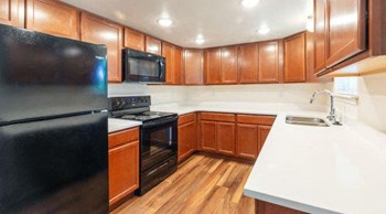 Fully Equipped Kitchen at Devonshire Court Apartments & Townhomes, North Logan, 84341 - Photo Gallery 3