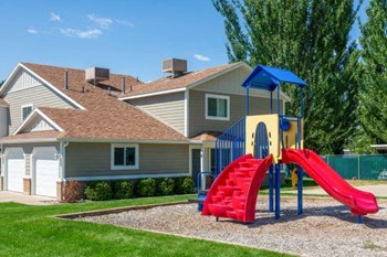 Playground And Playing Field at Devonshire Court Apartments & Townhomes, Utah, 84341 - Photo Gallery 21