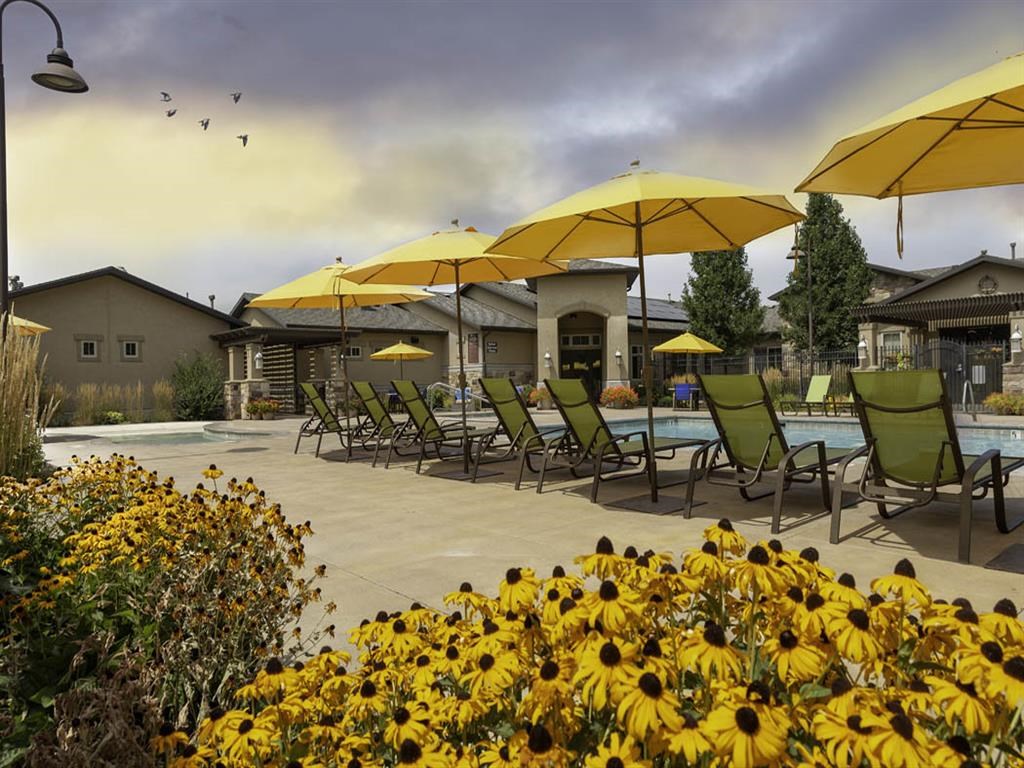 Poolside Relaxing Area at Four Seasons Apartments & Townhomes, North Logan