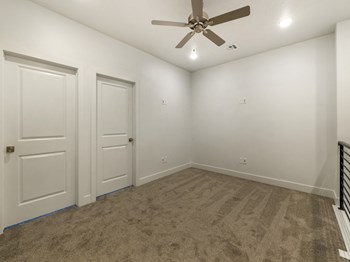Upstairs Open Space with Ceiling Fan at Desert Sage Townhomes, Hurricane, Utah - Photo Gallery 6