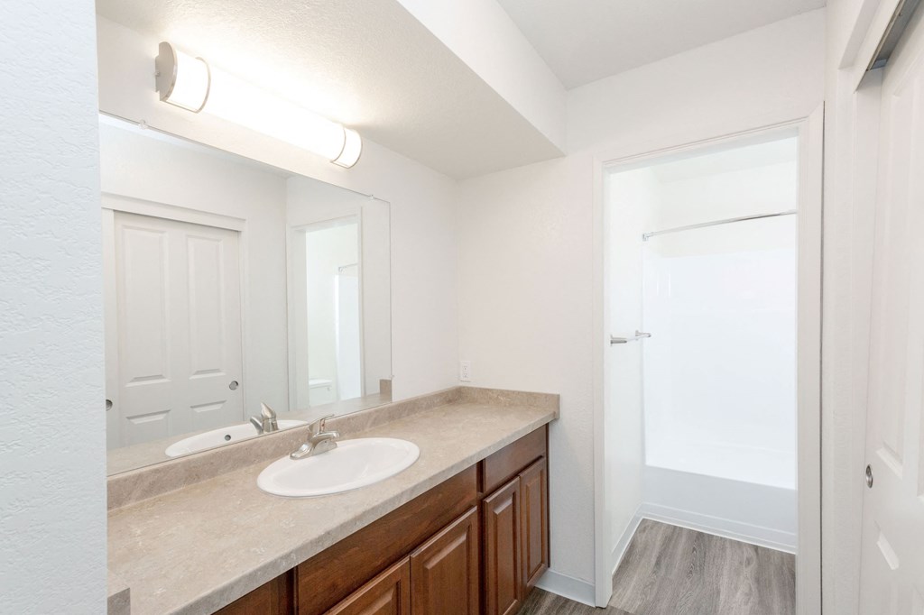Modern Split Bathroom with Large Closet  at River Oaks Apartments & Townhomes, Hanford, California