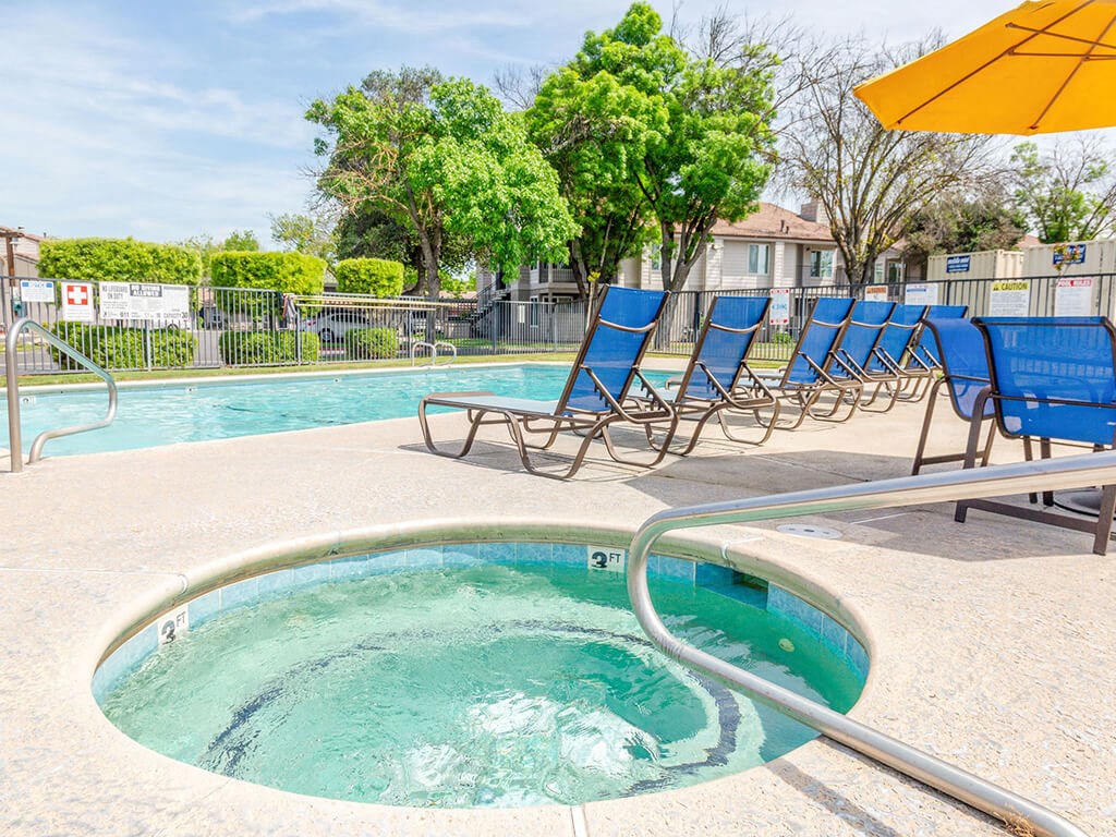 Luxurious Hot Spa & Pool with Lounges at River Oaks Apartments & Townhomes, Hanford, California