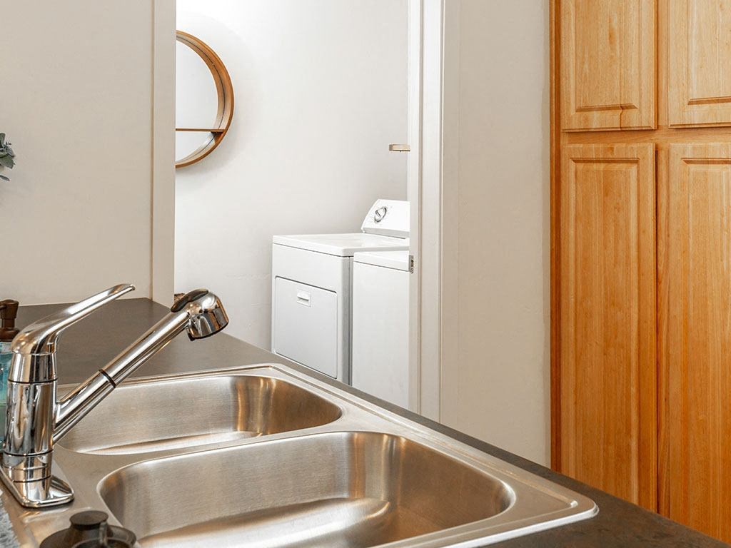 Stainless Steel Sink With Faucet In Kitchen at Four Seasons at Southtowne Apartments, South Jordan, UT, 84095