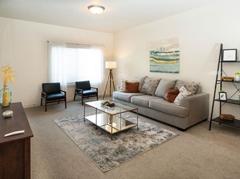 Modern Living Room Modern Living Room at Four Seasons at Southtowne Apartments, Utah - Photo Gallery 4