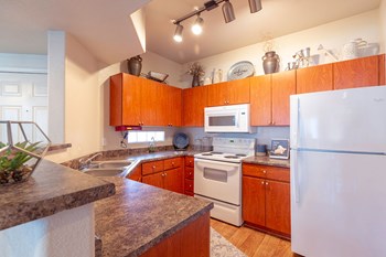 Fully Equipped Kitchen Fully Equipped Kitchen at Canyon Ridge Apartments, Surprise, AZ - Photo Gallery 4