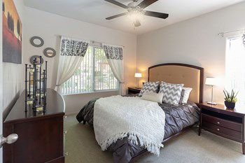 Well Decorated Bedroom With Natural Light Well Decorated Bedroom With Natural Light at Canyon Ridge Apartments, Arizona - Photo Gallery 6