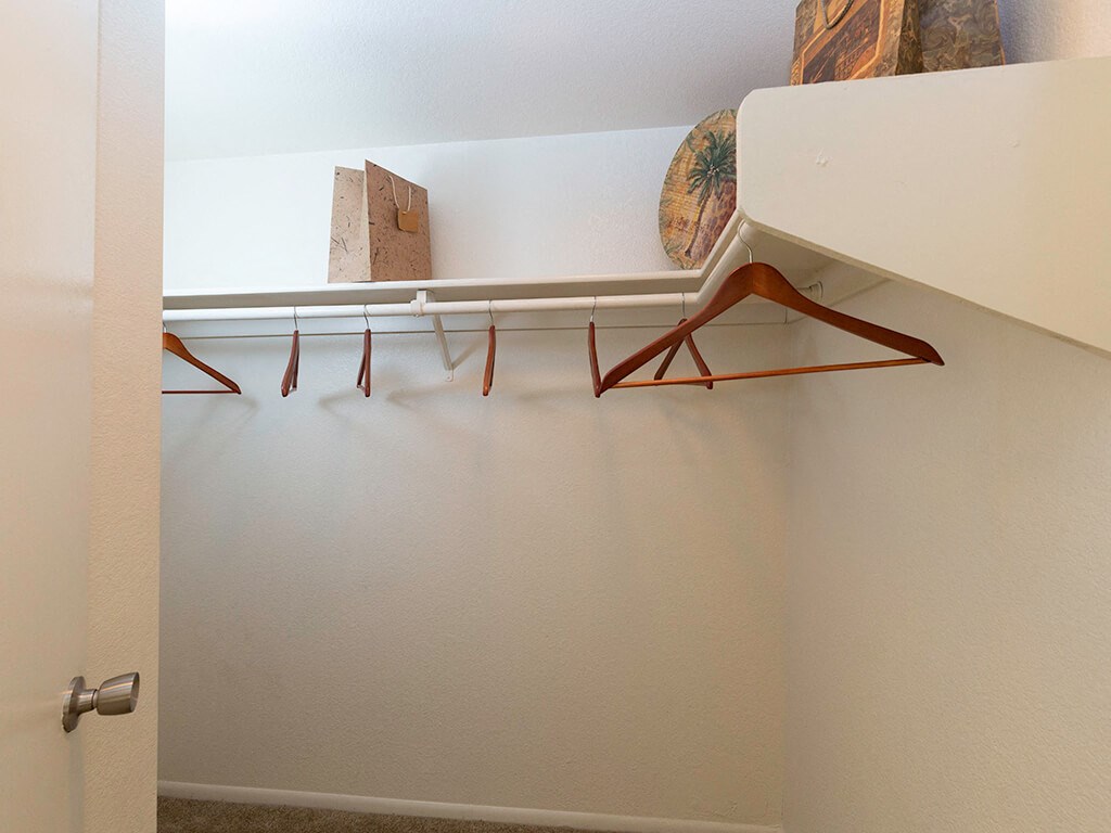 walk in closet with bright lighting at Glen Oaks Apartments, Glendale, AZ