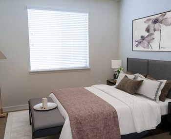 Bedroom With Plenty Of Natural Lights at Falls at Riverwoods Apartments & Townhomes, Logan
