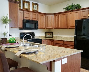Eat-In Kitchen Table With Sink at Falls at Riverwoods Apartments & Townhomes, Utah