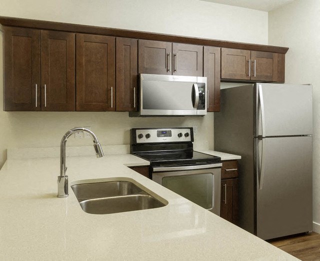 Sink With Faucet In Kitchen at Four Seasons Apartments & Townhomes, North Logan, 84341