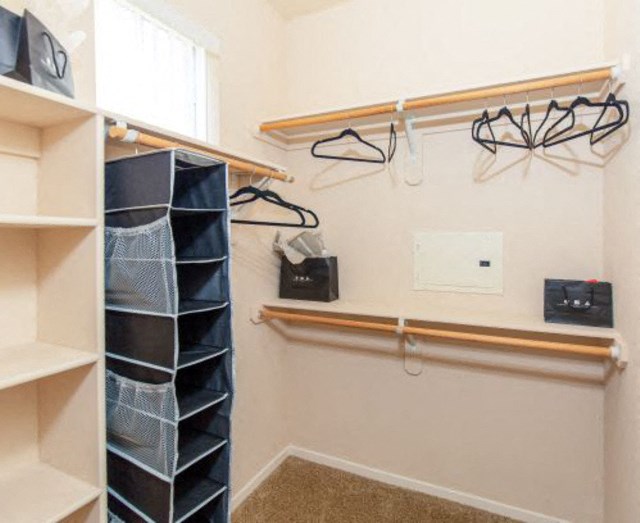 Walk-In Closets With Built-In Shelving at Indigo Creek Apartments, Thornton, 80229