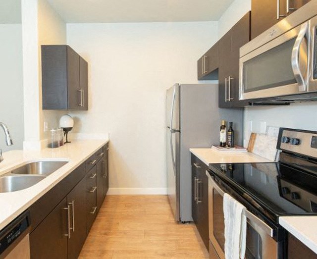 Refrigerator And Kitchen Appliances at Parc on Center Apartments & Townhomes, Orem, 84057
