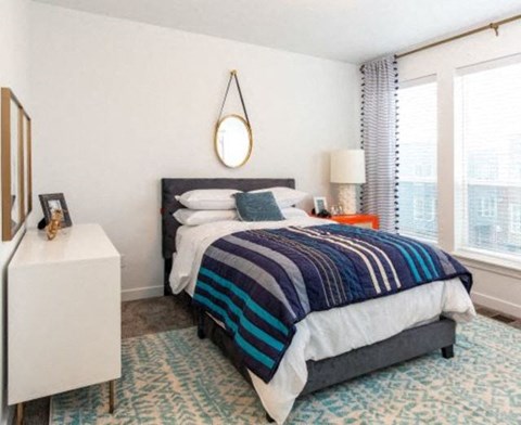 Beautiful Guest Bedroom With Wide Windows at Parc View Apartments & Townhomes, Midvale, Utah