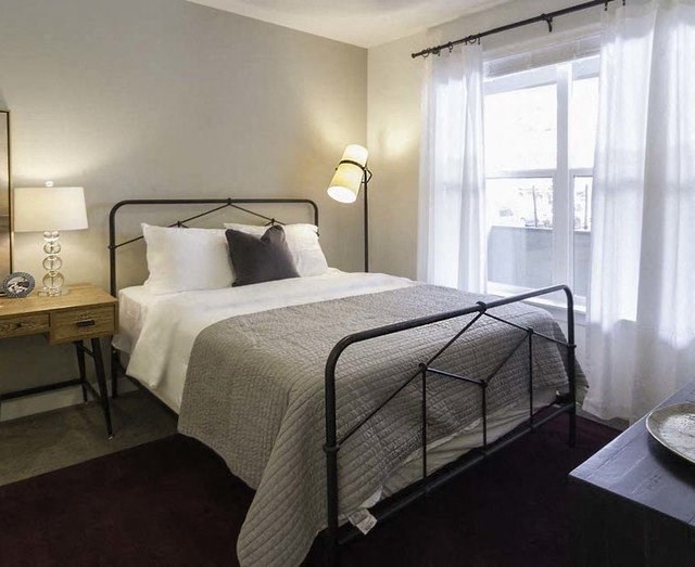 Bedroom With Expansive Windows at Parc West Apartments, Utah
