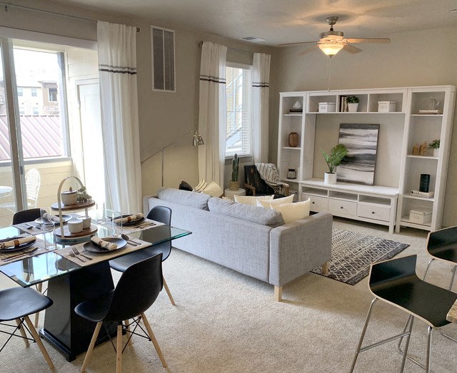 Living Room With Dining Area at San Marino Apartments, South Jordan, UT