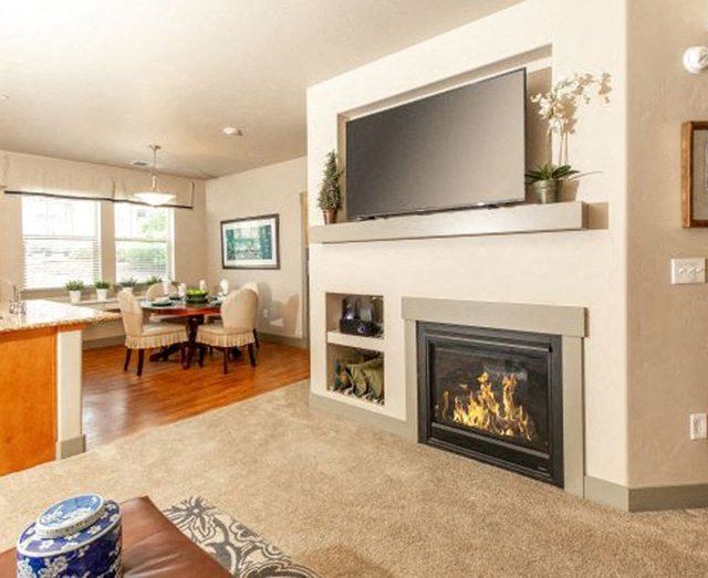 Clubroom With Smart Tv And Fireplace Clubroom With Smart Tv And Fireplace at San Moritz Apartments, Midvale