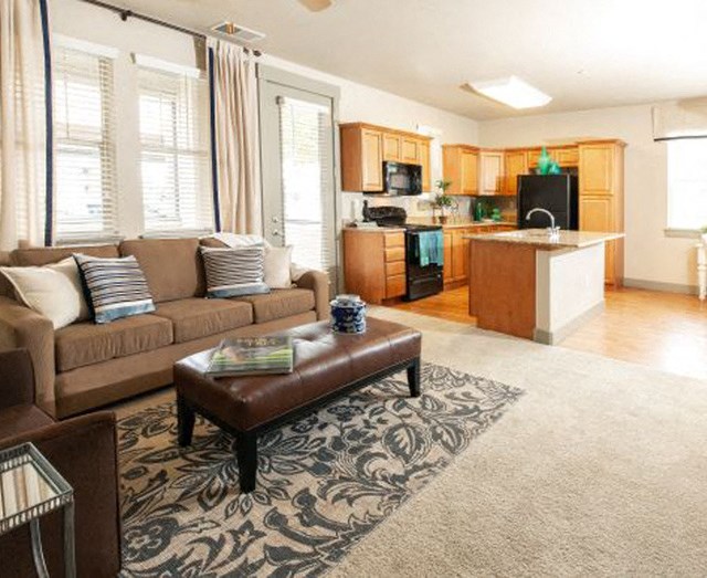 Living Room Living Room With Kitchen View Kitchen View at San Moritz Apartments, Midvale, UT, 84047