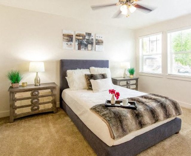Comfortable Bedroom With Large Window at San Moritz Apartments, Midvale, UT