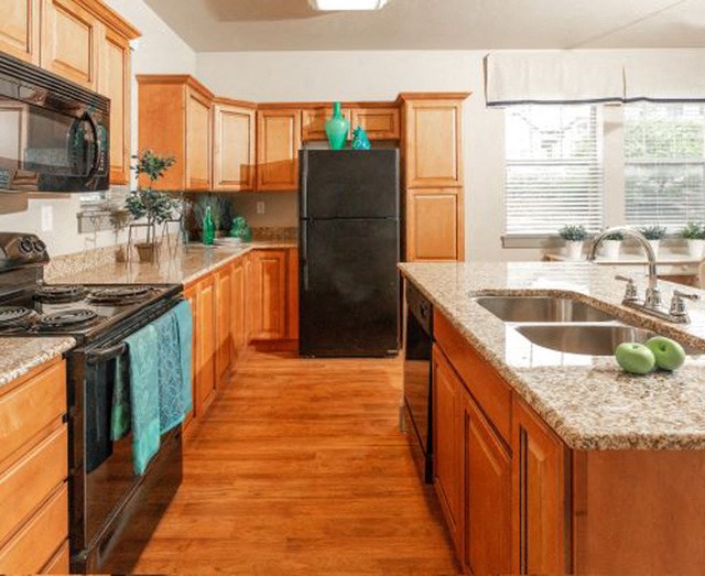 Fully Equipped Kitchen With Stainless Steel Appliances at San Moritz Apartments, Midvale, Utah
