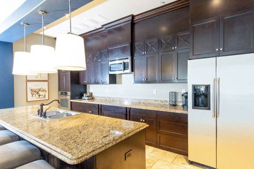 Granite Countertop Kitchen in Resident Clubhouse at San Moritz Apartments, Utah