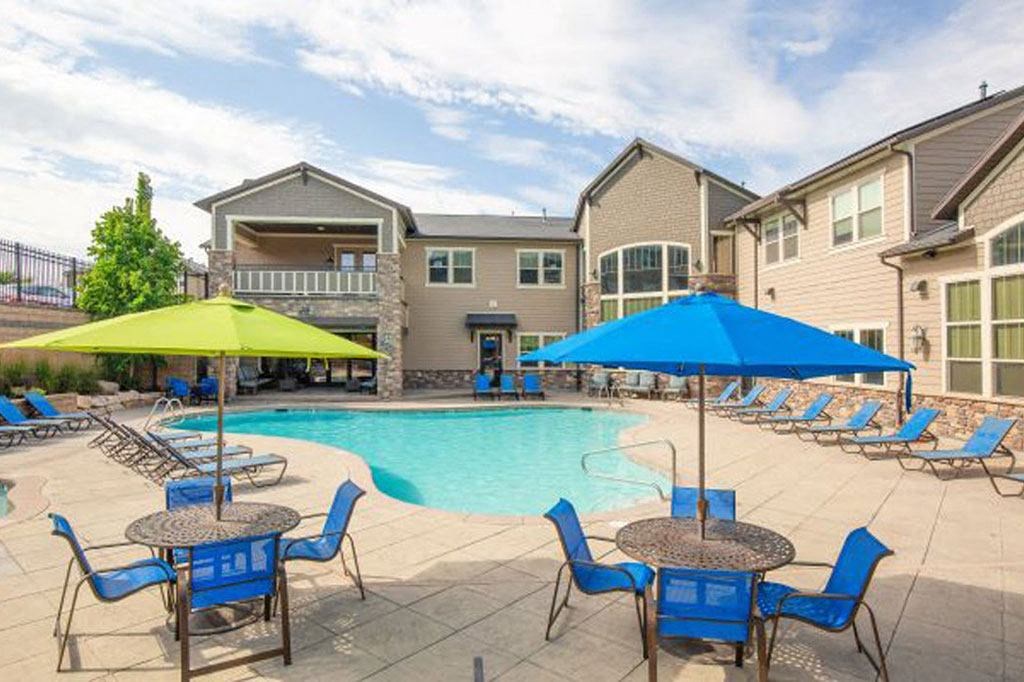 Poolside Dining Tables at San Moritz Apartments, Midvale, 84047