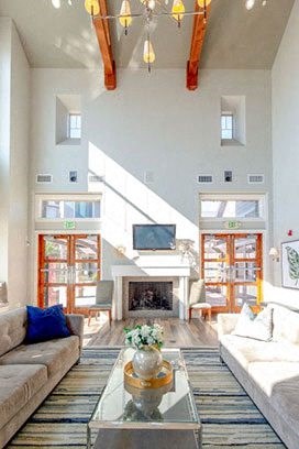 Resident Clubhouse with Fireplace Sitting Area at San Tropez Apartments & Townhomes, South Jordan, Utah