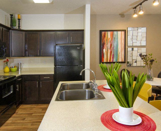Granite Countertop Kitchen Island Granite Countertop Kitchen Island at Talavera at the Junction Apartments & Townhomes, Midvale, UT, 84047 - Photo Gallery