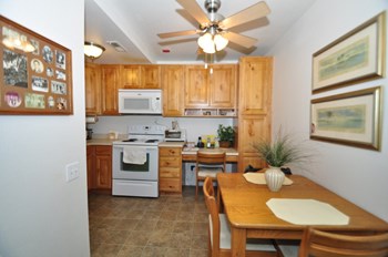 Kitchen & Dining Room at Heritage Park Senior Apartments Kitchen & Dining Room at Heritage Park Senior Apartments - Norco CA - Photo Gallery 5