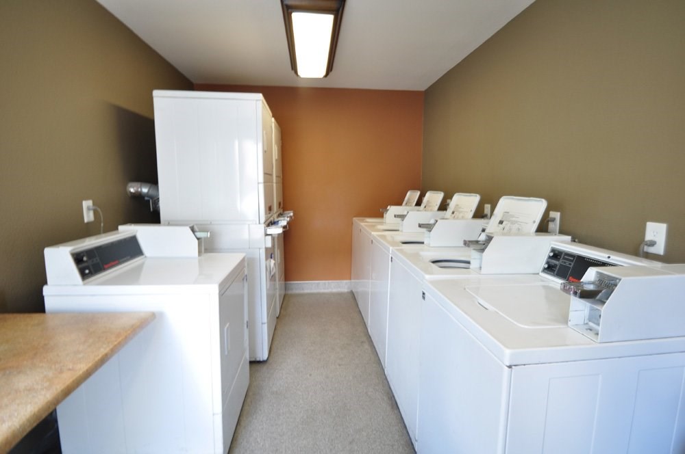 Community Laundry Center at  Peppertree Senior Apartments  - Near San Diego California