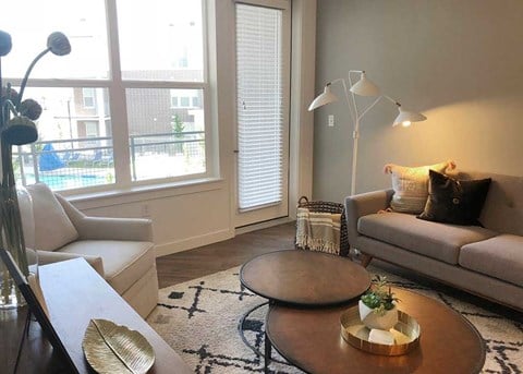 a living room with two couches and a coffee table