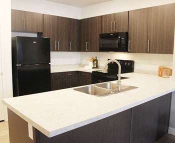 Modern Kitchen at Arcadia Affordable Apartments in Sandy Utah Modern Kitchen at Arcadia Affordable Apartments in Sandy Utah - Photo Gallery 3