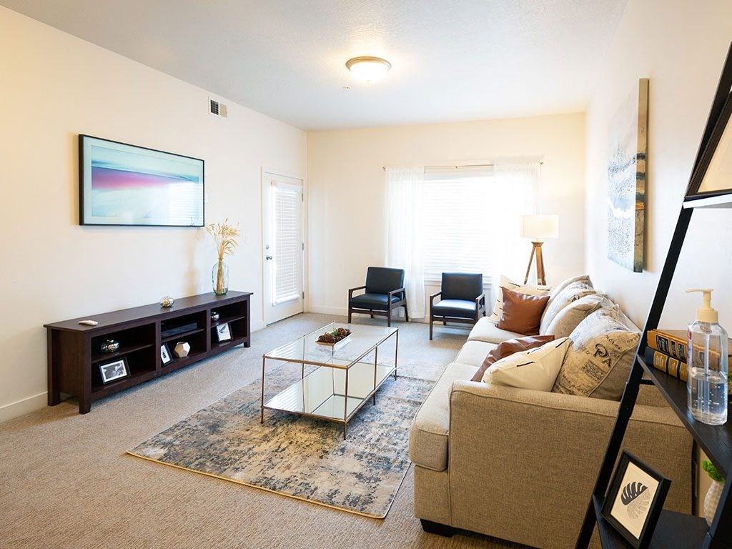 Classic Living Room Design With Television at Four Seasons at Southtowne Apartments, South Jordan, UT, 84095
