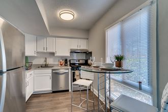 Chef-Inspired Kitchens Feature Stainless Steel Appliances at River Pointe Apartments, ZPM, Fort Washington, 20744 - Photo Gallery 4