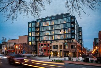 Nighttime exterior image of The Shaw