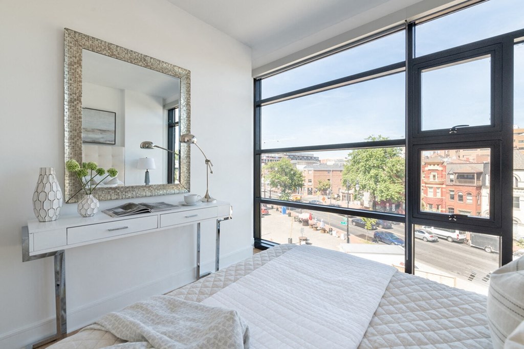 Bedroom with floor to ceiling windows