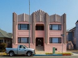 Pink two story apartment building