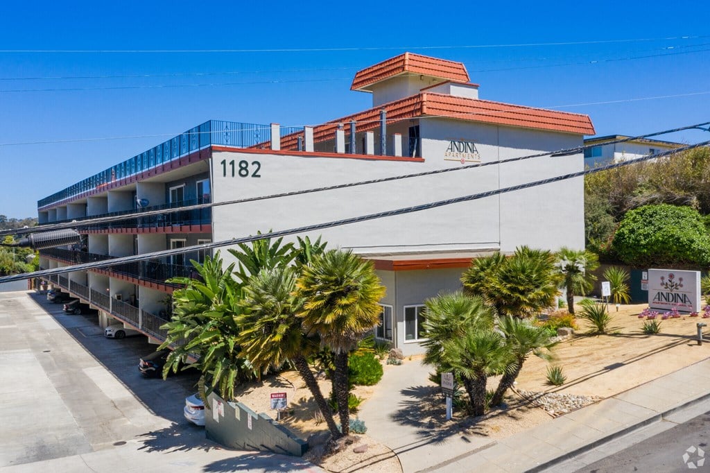 3 story building and parking driveway