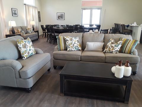 community room couches and dining area