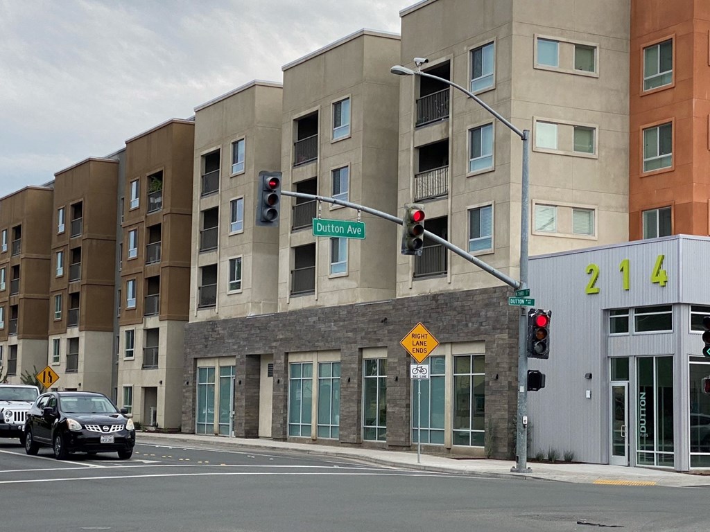 A street view of a building with a sign that says 214.