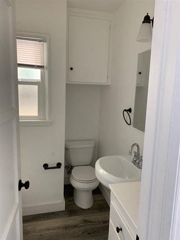 Bathroom with toilet and sink - Photo Gallery 6