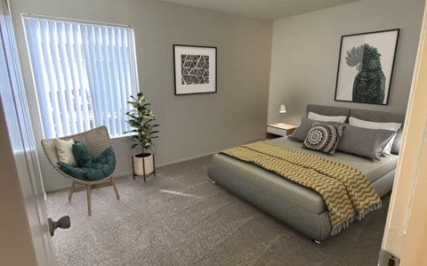 A bedroom with a bed, chair, and two pictures on the wall.