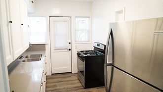 Kitchen stainless-steel fridge and stove 