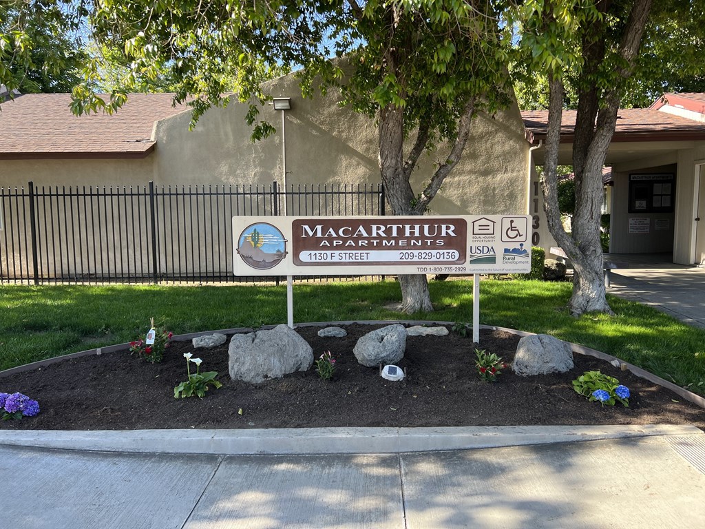 a sign in front of a building