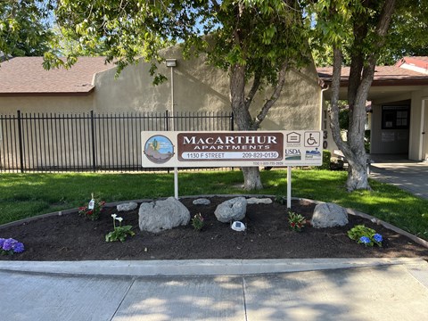a sign in front of a building