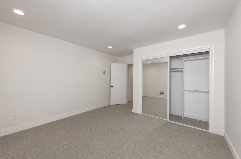 Midvale Interior of Apartments Bedroom Showing Closet Slide Doors