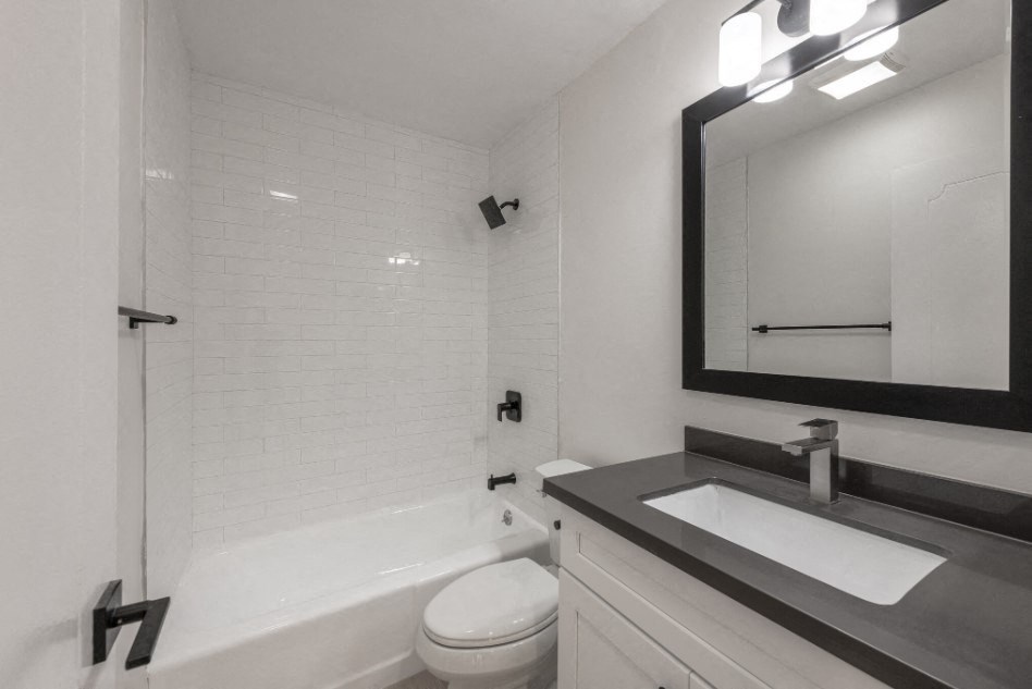 Midvale Interior of Apartments tub/shower, toilet, and sink