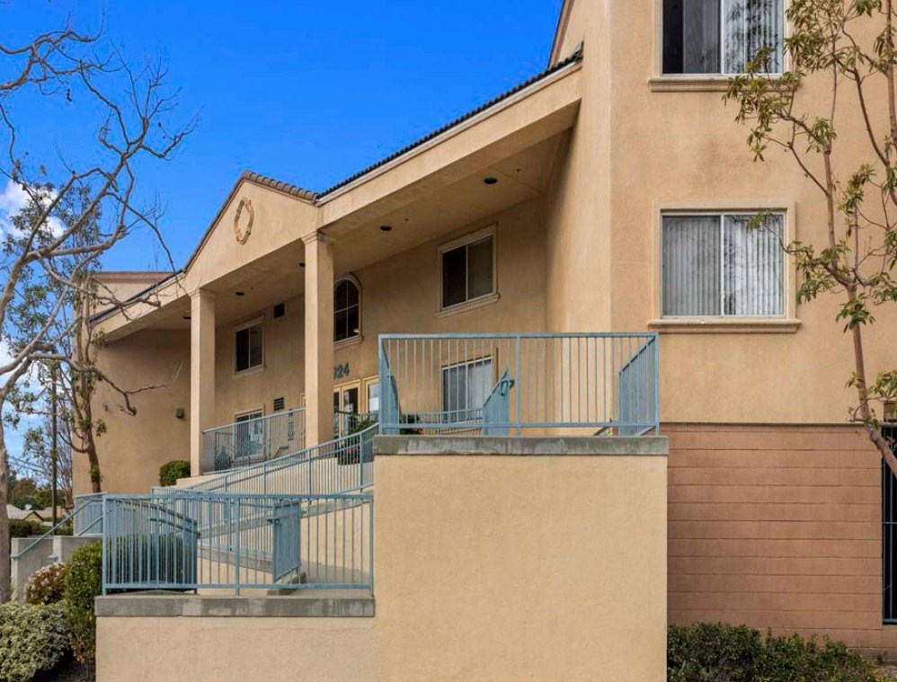 a building with a clock on the side of it
