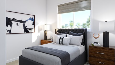 A bedroom with a large bed, a nightstand with a lamp, and a painting on the wall.