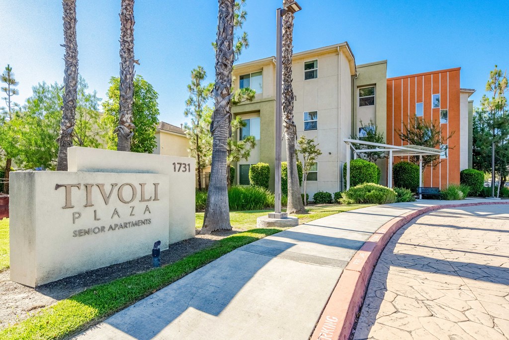 property front entrance with sign stating Tivoli Plaza